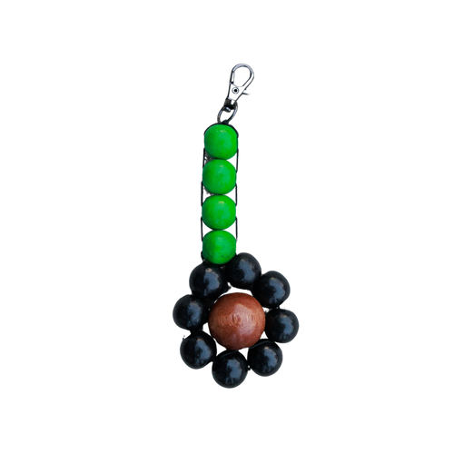Keychain with green, black, and brown beads on a white background