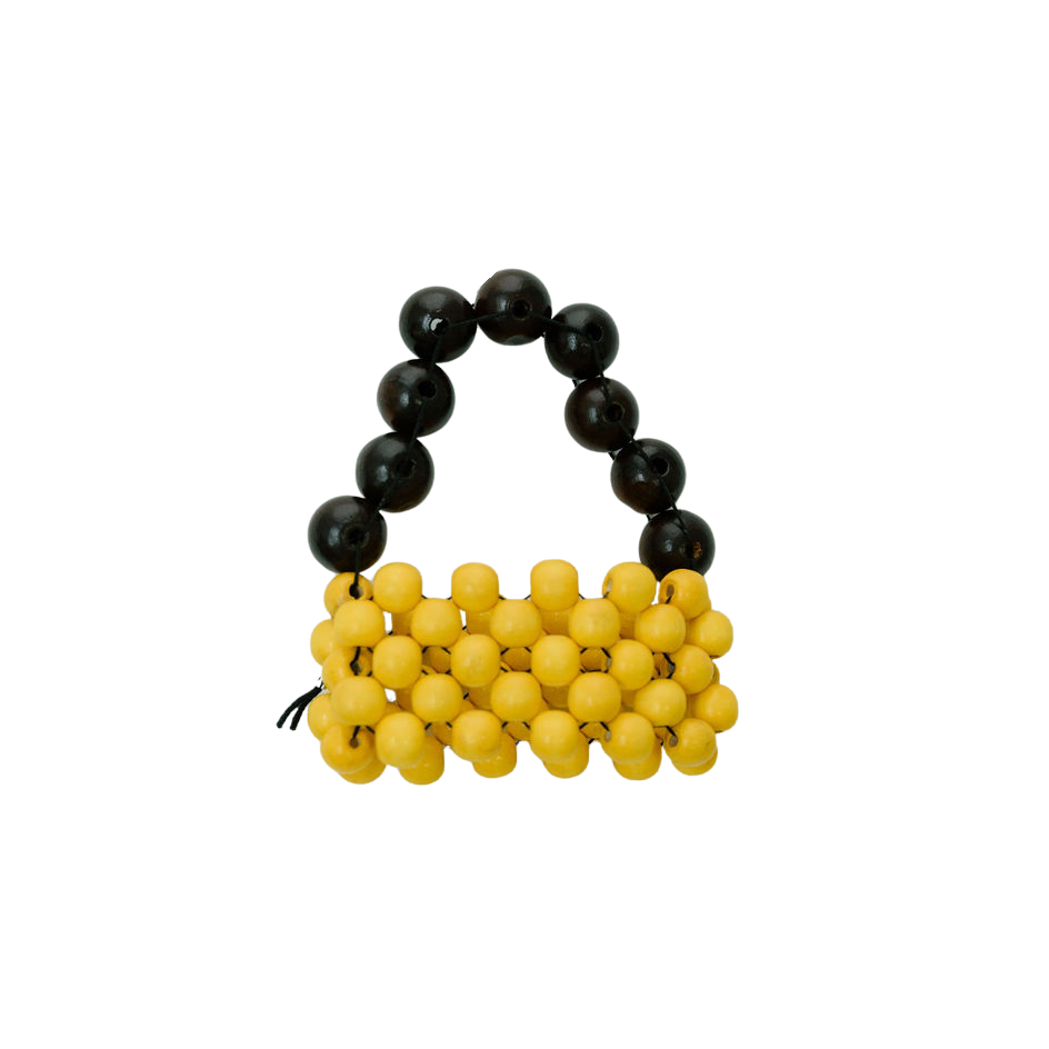Yellow beaded handbag with black handle on a white background